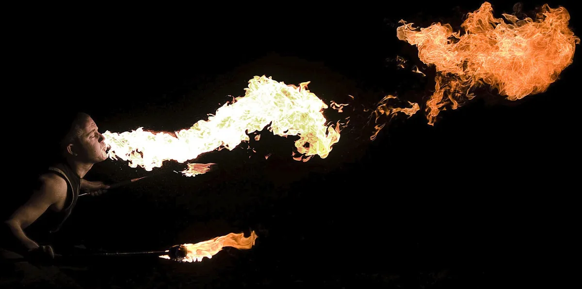 Tim Marston fire breather performing a fire breathing show